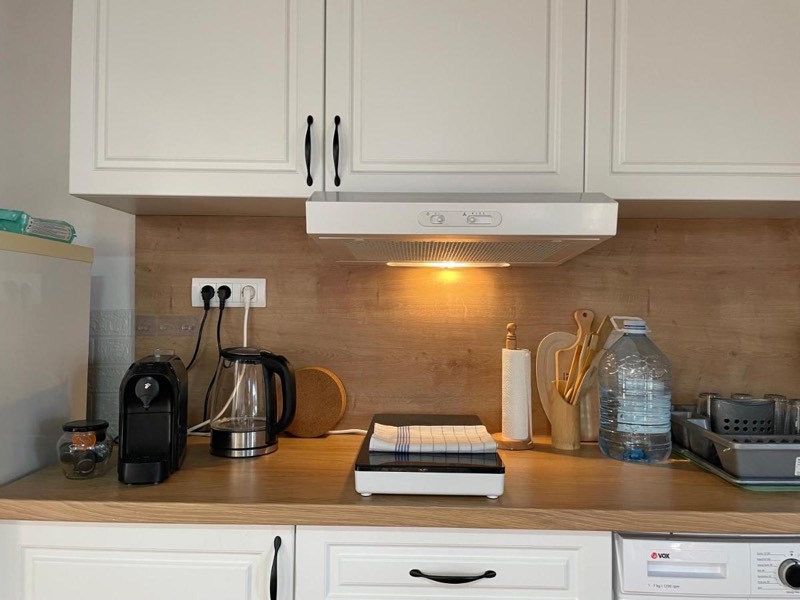 Worktop with a coffee machine, kettle and hob